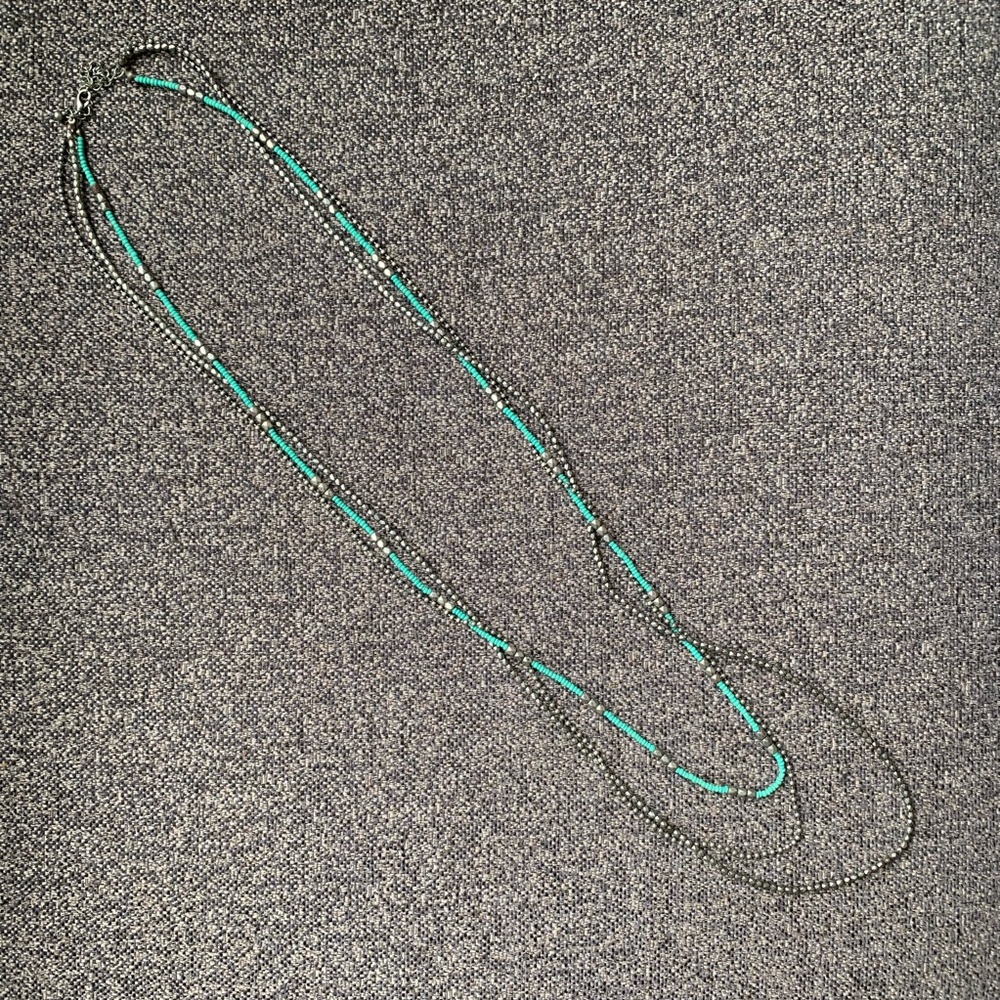 Long teal and silver beaded necklace